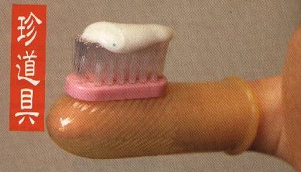 brosse dent doigt